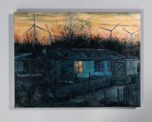 A dark painting of a shabby bungalow surrounded by fencing. It has one light on, with the bare trees and wind turbines in the background.