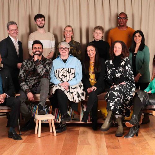 The Advisory Board of the AAC posing together and smiling at the camera.