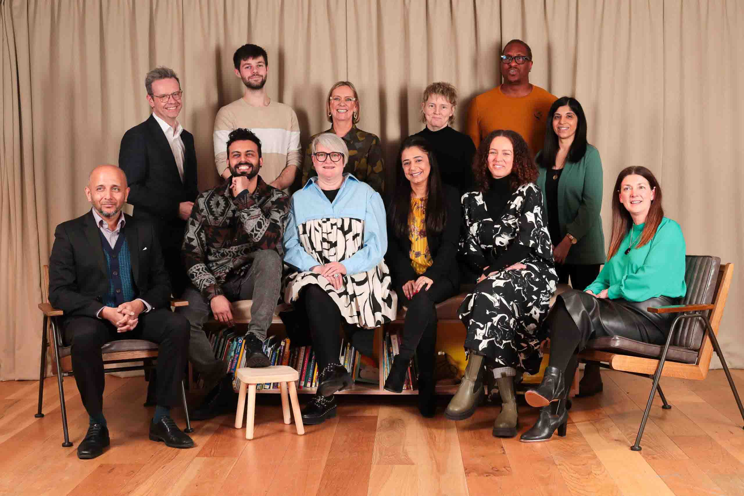 The Advisory Board of the AAC posing together and smiling at the camera.