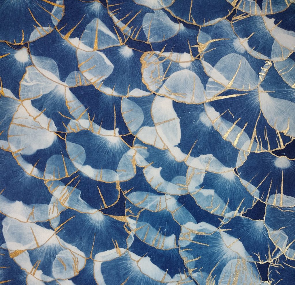 Layered blue and gold cynatopes of ginkgo leaves.