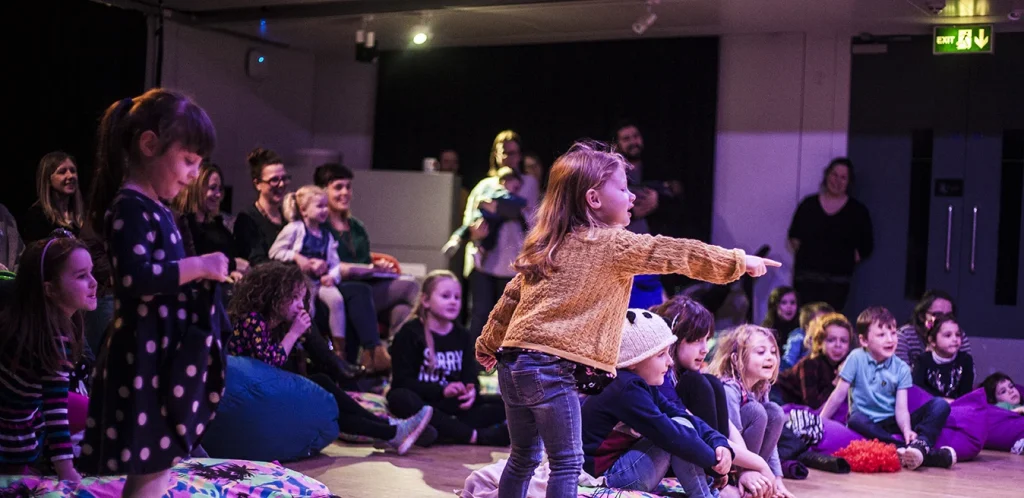 Kids watching a show