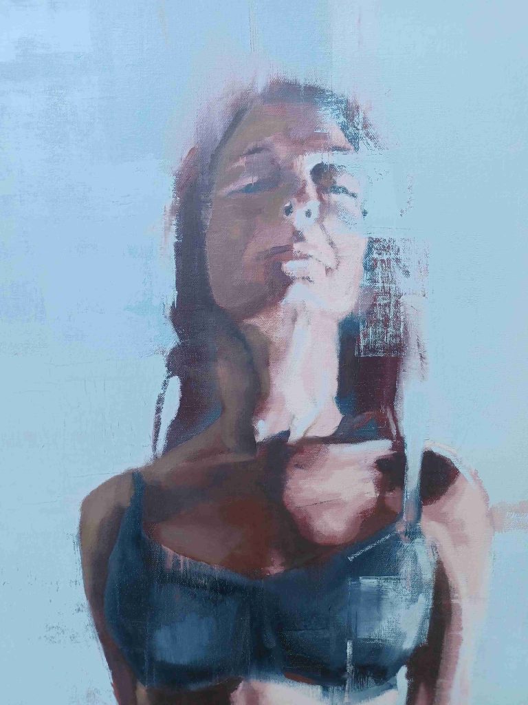 A oil painting in blue of a women looking up in a bra.