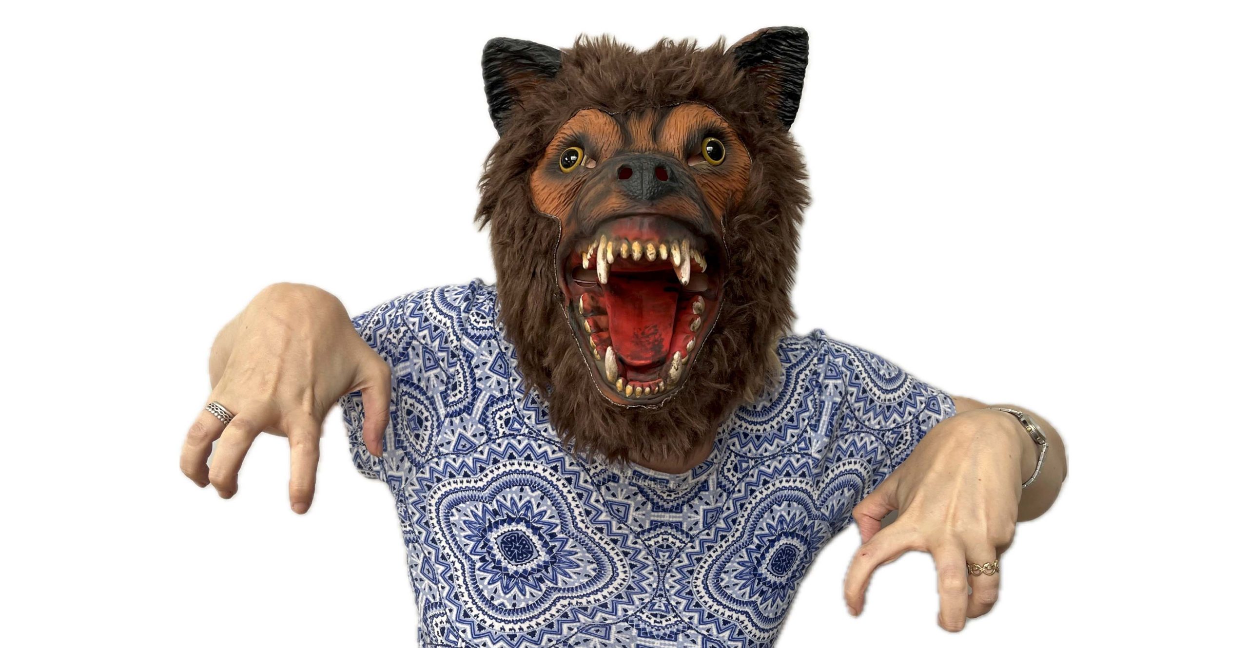 A person in a wolf mask growling.