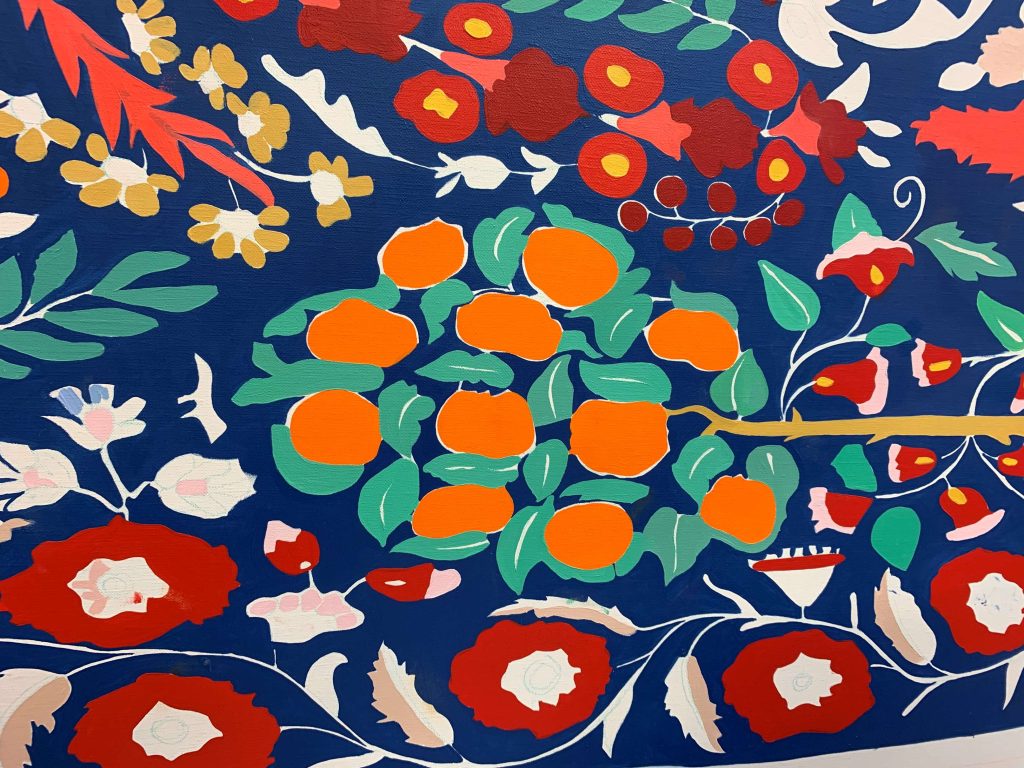 A painted print of blue, orange and red fauna.