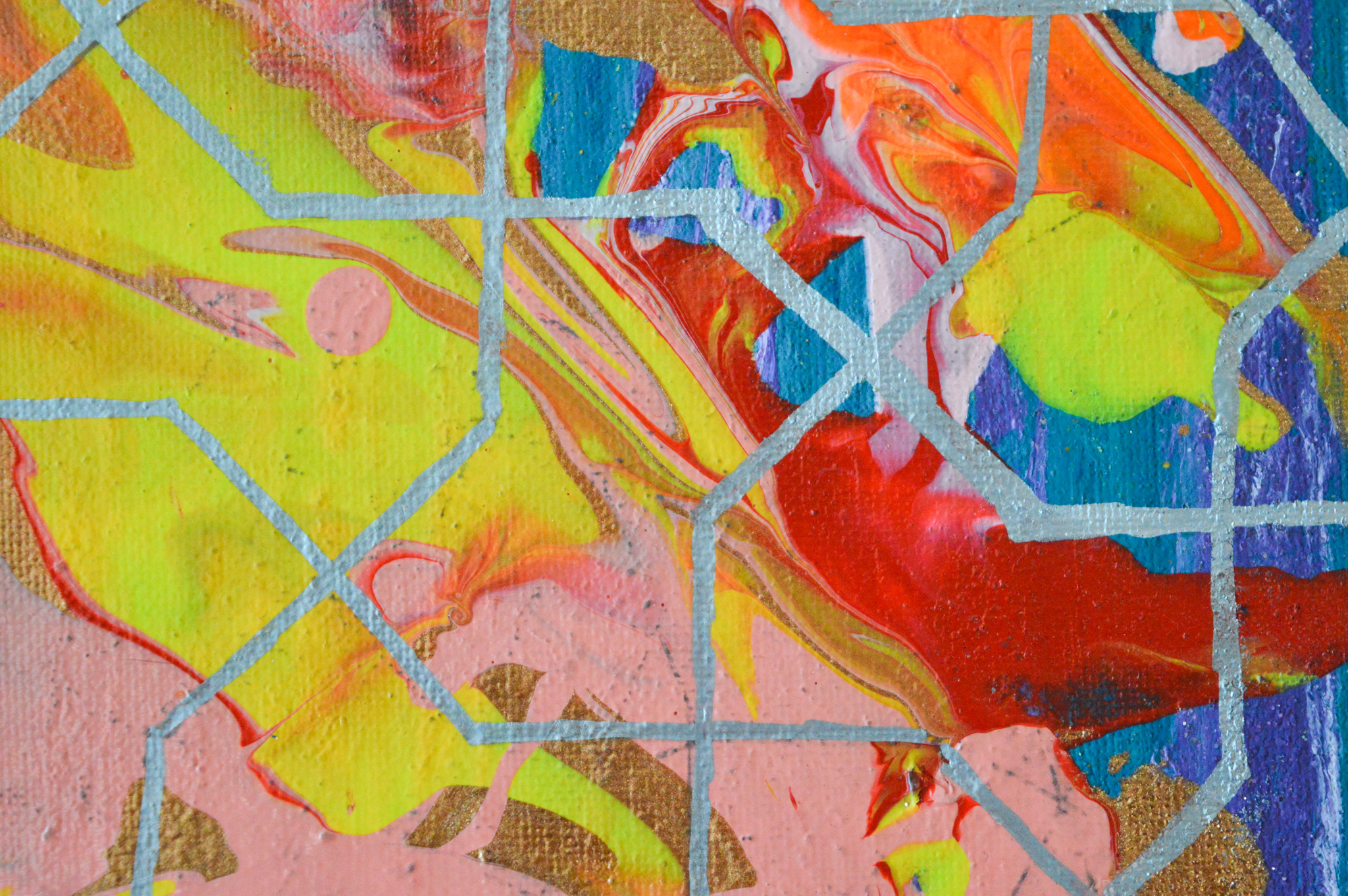 A mixed palette of different swirls of coloured paint broken up by abstract silver lines across the image.
