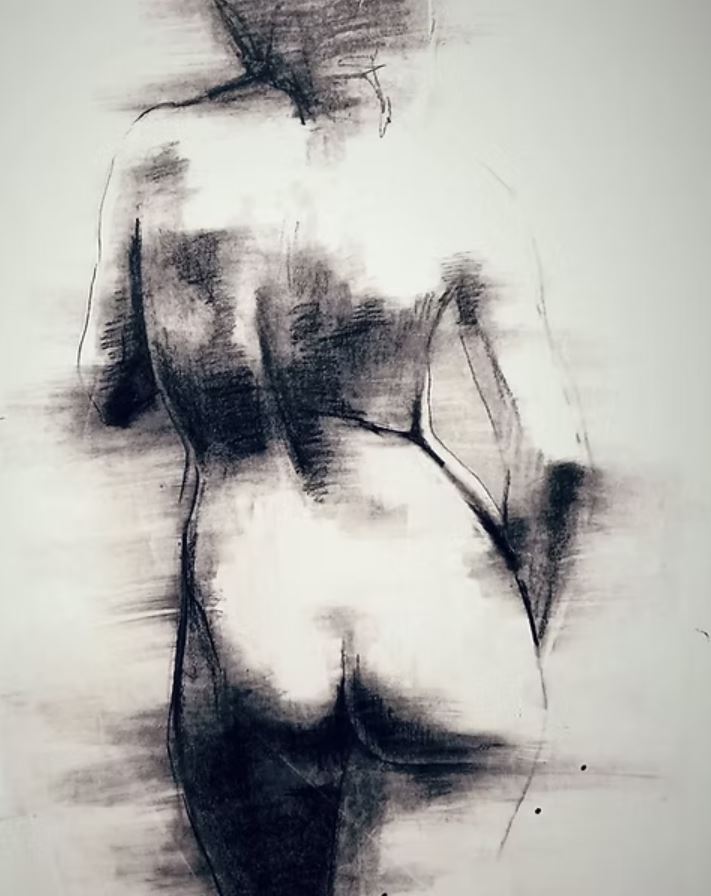 The back view of a naked woman draw in charcoal.